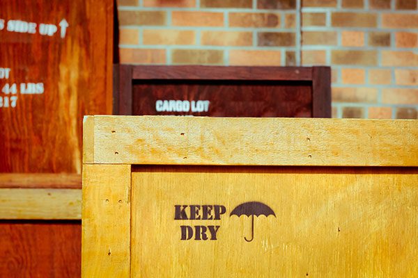 Stacked wooden cargo crates for moving services